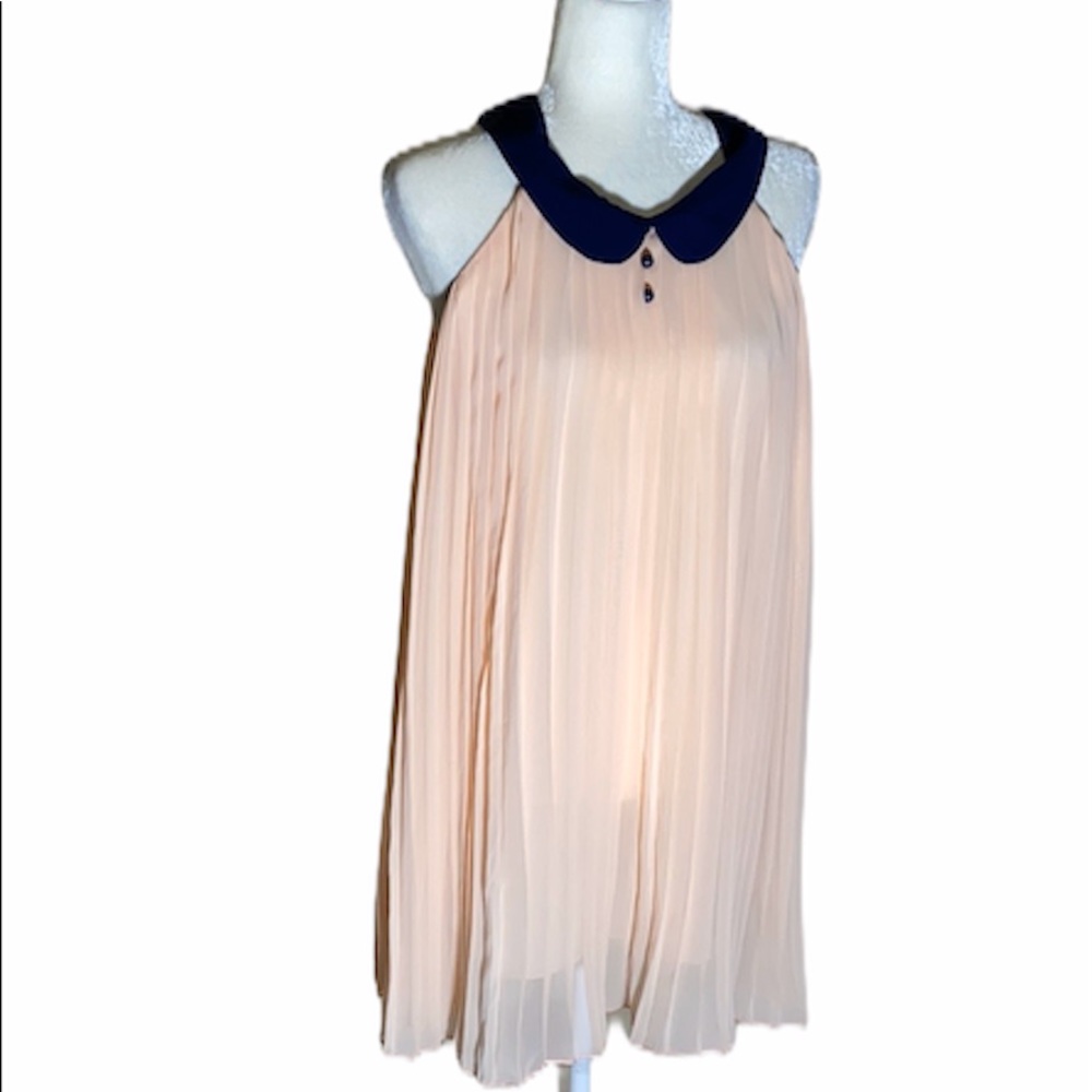 Lulu’s sleeveless babydoll pink dress